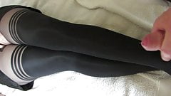 Thick cum on her nylon legs, tights layered over stockings
